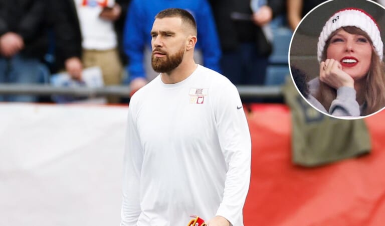 Travis Kelce Gazes at Taylor Swift Poster Ahead of Chiefs Game