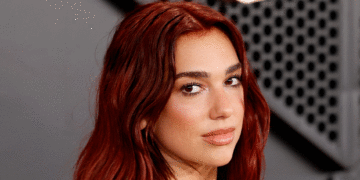 Dua Lipa Shuts Down the Grammys Carpet in This Plunging Gown